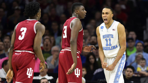 Mar 25, 2016; Philadelphia, PA, USA; North Carolina Tar Heels forward Brice Johnson (11) reacts as Indiana Hoosiers center Thomas Bryant (31) looks on during the second half in a semifinal game in the East regional of the NCAA Tournament at Wells Fargo Center. Mandatory Credit: Bob Donnan-USA TODAY Sports